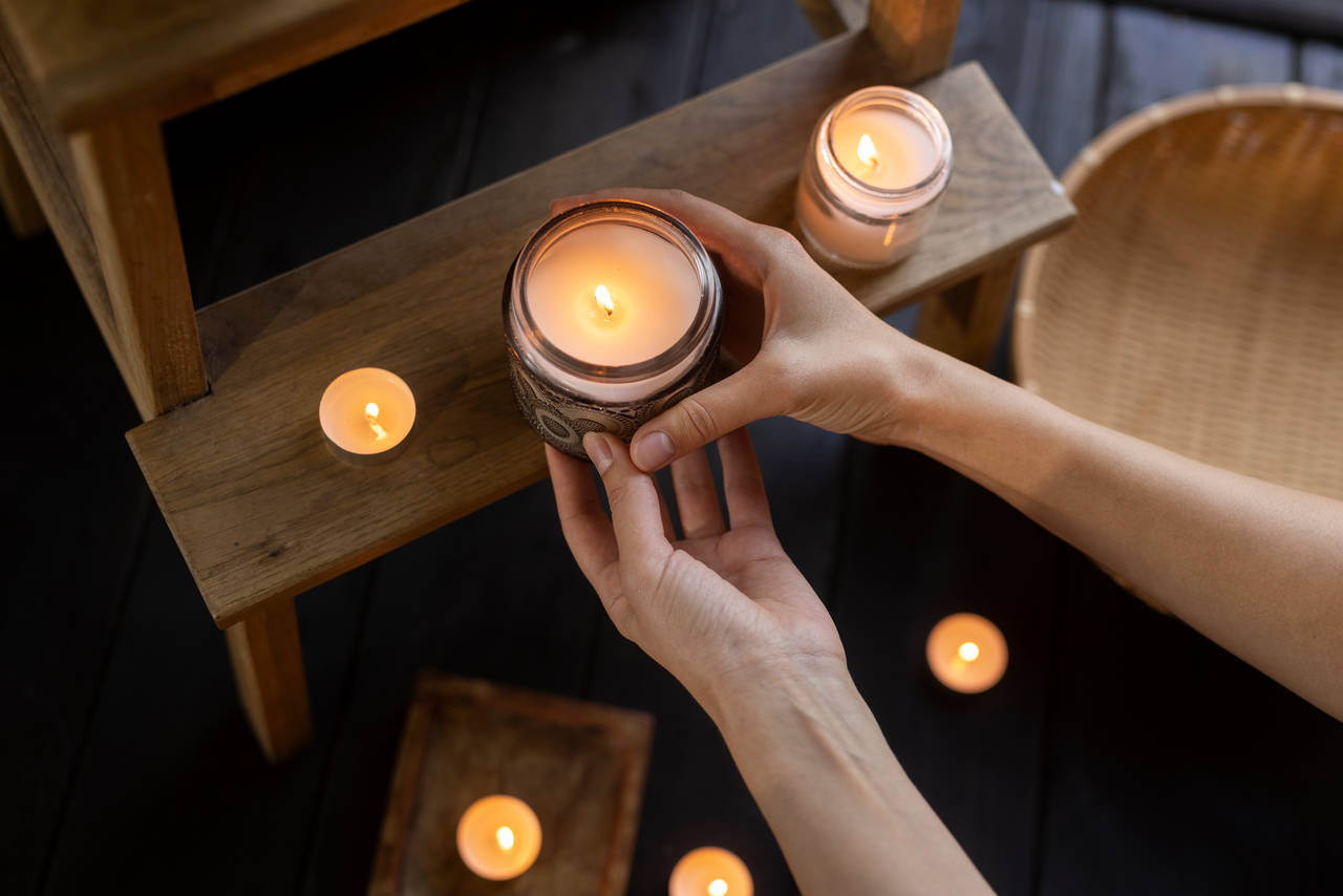 top-view-woman-holding-candle.jpg